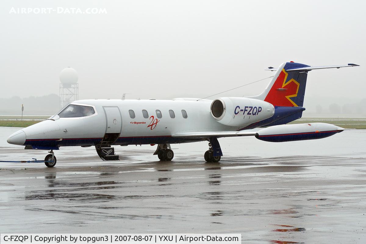C-FZQP, 1978 Learjet 35A C/N 168, Parked in the rain at Esso ramp.