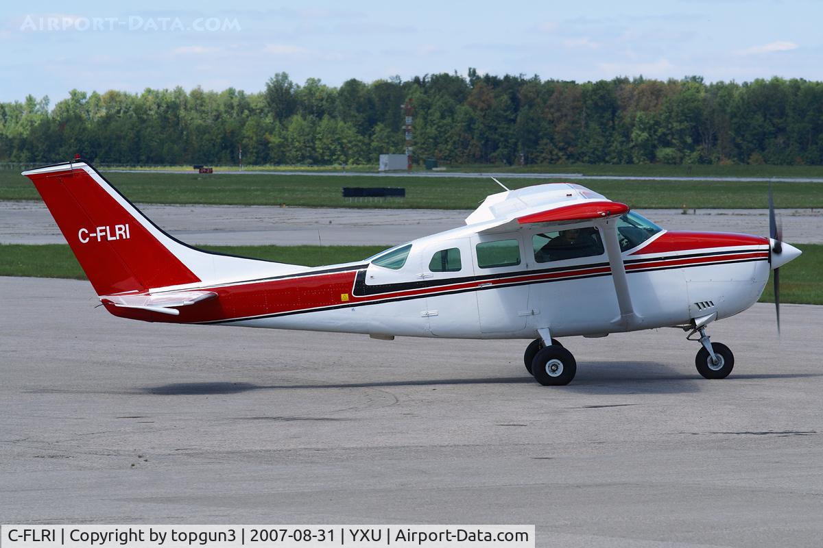 C-FLRI, 1972 Cessna U206F Stationair C/N U20601762, Taxiing across Ramp III for departure.