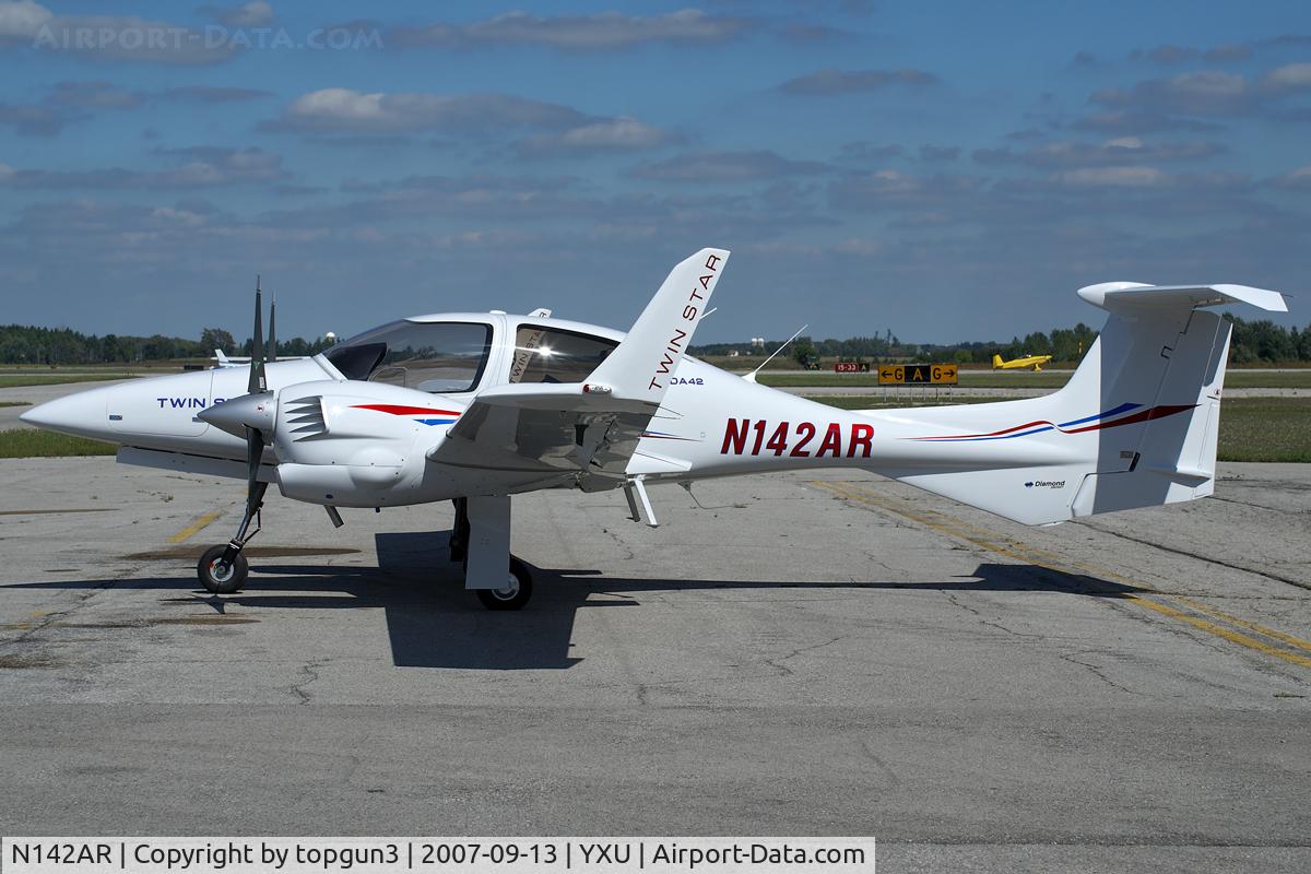 N142AR, 2007 Diamond DA-42 Twin Star C/N 42.AC075, Parked in front of Katana Kafe.