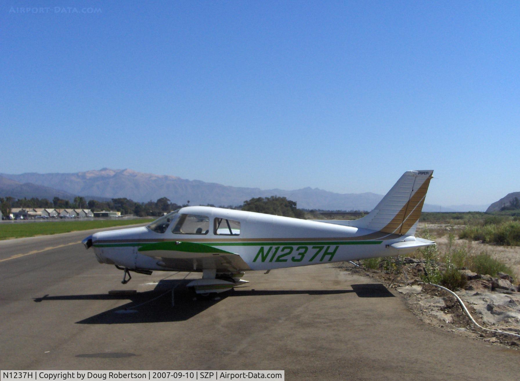 N1237H, Piper PA-28-140 Cruiser C/N 28-7725137, 1976 Piper PA-28-140 FLIGHTLINER, Lycoming O-320-E3D 150 Hp, landed hard & long on Rwy 22-bounced twice-overran end and crashed into dirt berm, aircraft totaled by Insurance Co., landing gear, spinner, prop, wings, fuselage damage