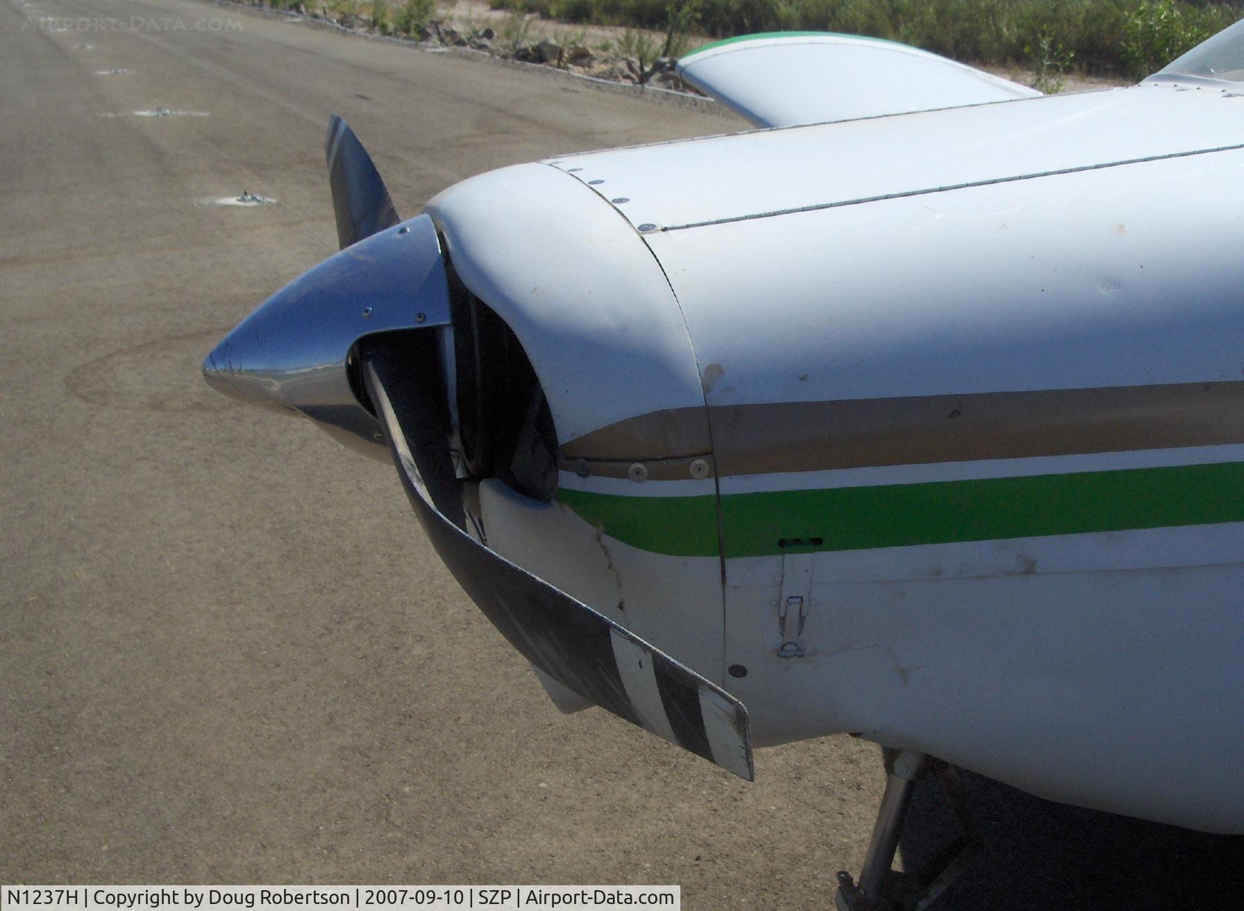 N1237H, Piper PA-28-140 Cruiser C/N 28-7725137, 1976 Piper PA-28-140 CRUISER, Lycoming O-320-E3D 150 Hp, landed long & hard on Rwy 22-bounced twice-overran end and crashed into dirt berm, aircraft totaled by Insurance Co., landing gear, spinner, prop, wings, fuselage damage, bent prop