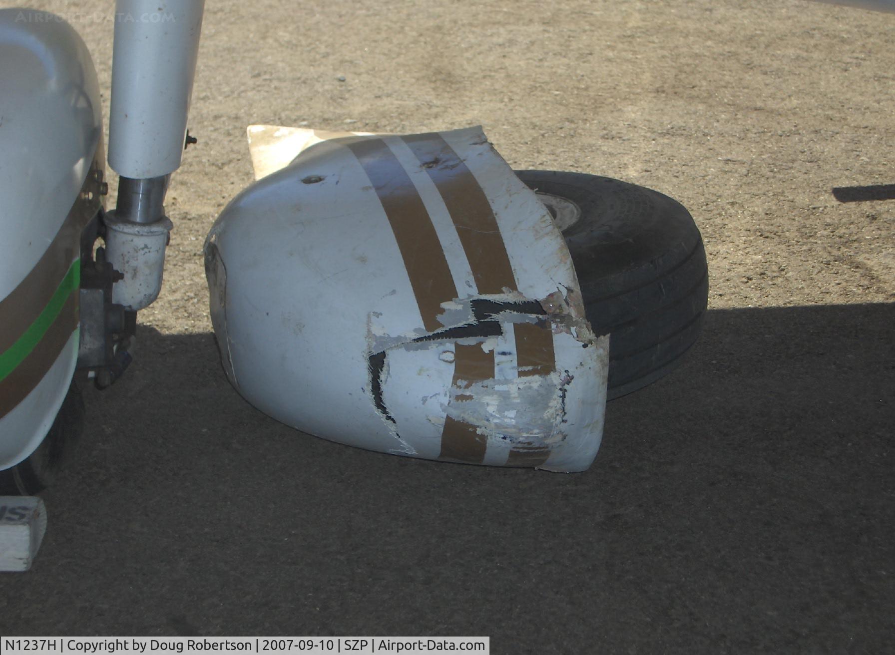 N1237H, Piper PA-28-140 Cruiser C/N 28-7725137, 1976 Piper PA-28-140 CRUISER, Lycoming O-320-E3D 150 Hp, landed long on Rwy 22-overran end and crashed into dirt berm, aircraft totaled by Insurance Co., landing gear, spinner, prop, wings, fuselage damage, nose wheel