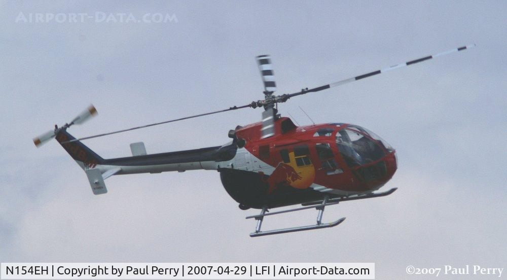 N154EH, 1985 MBB Bo-105CBS-4 C/N S-704, Banking around. It's hard to show rolls with still photos