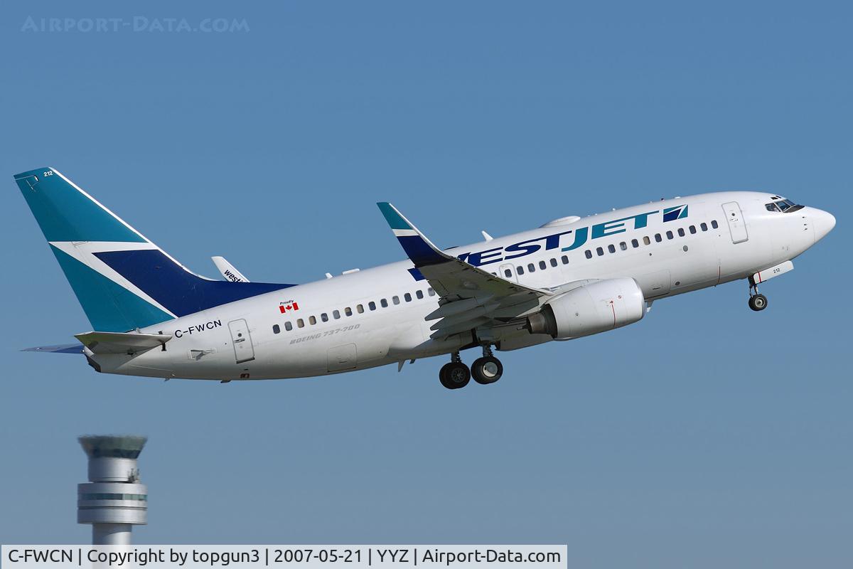 C-FWCN, 2003 Boeing 737-7CT C/N 33698, Departing from RWY06R.