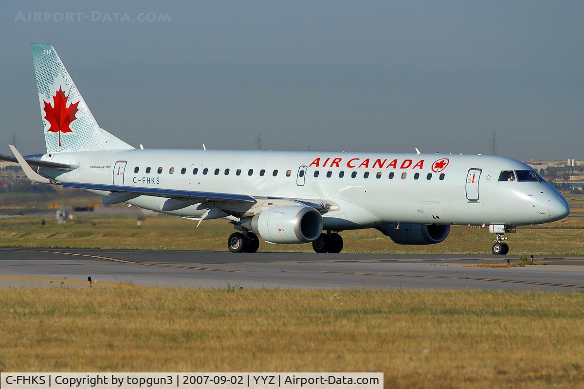 C-FHKS, 2007 Embraer 190AR (ERJ-190-100IGW) C/N 19000064, Taxiing for departure via RWY23.