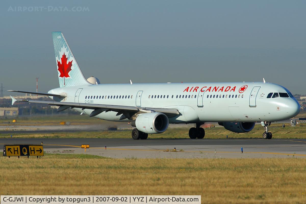 C-GJWI, 2002 Airbus A321-211 C/N 1772, Taxiing for departure via RWY23.