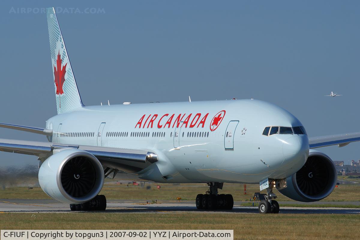 C-FIUF, 2007 Boeing 777-233/LR C/N 35243, Taxiing for departure via RWY23.