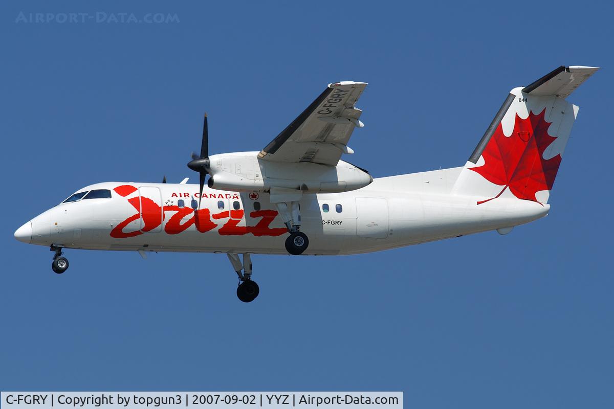 C-FGRY, 1990 De Havilland Canada DHC-8-102 Dash 8 C/N 212, Short final for RWY24L.