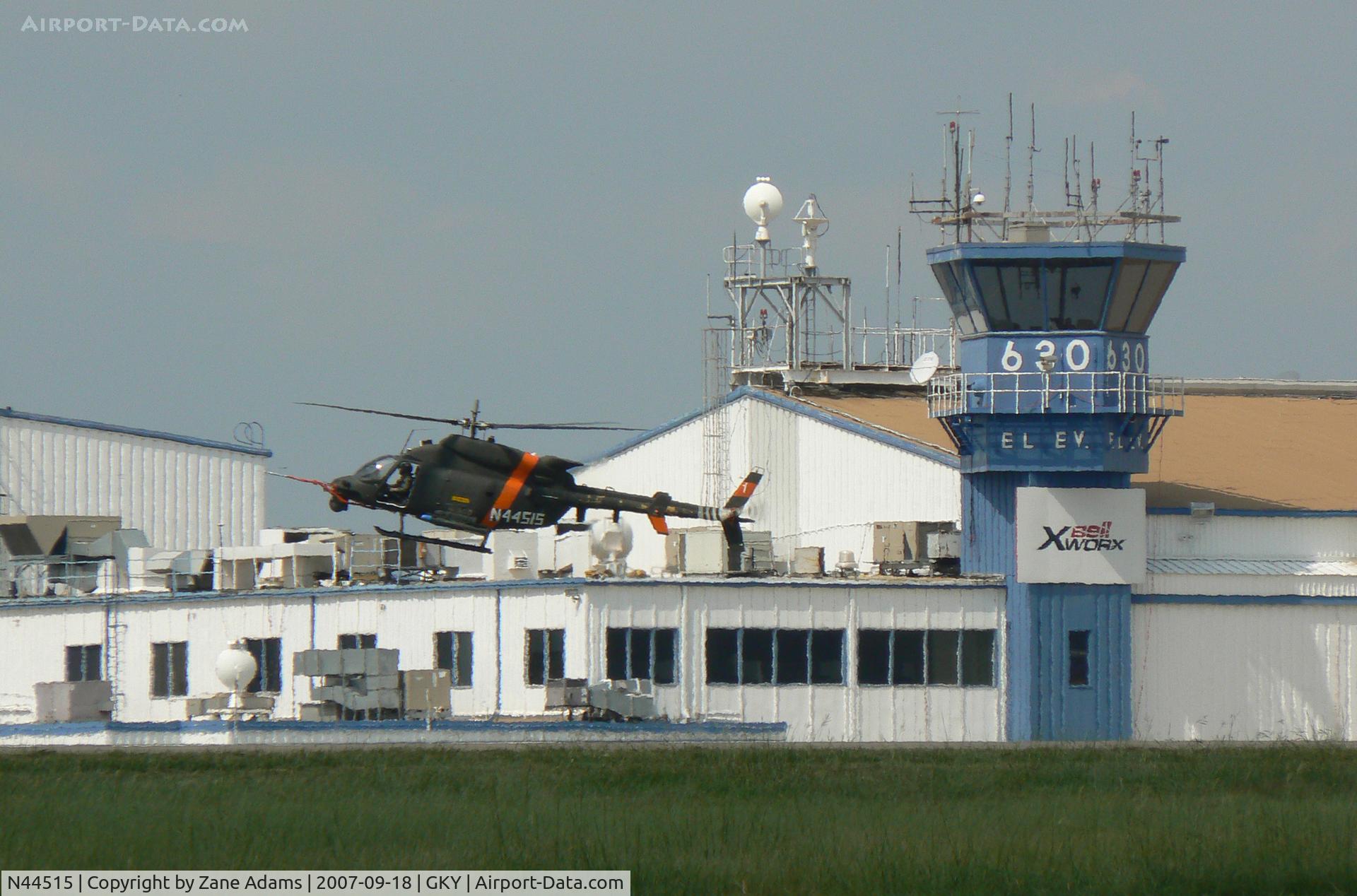 N44515, 2006 Bell 445 C/N 53903, Bell ARH Program - Ship 1 flying past the XworX Tower and Hnger Building