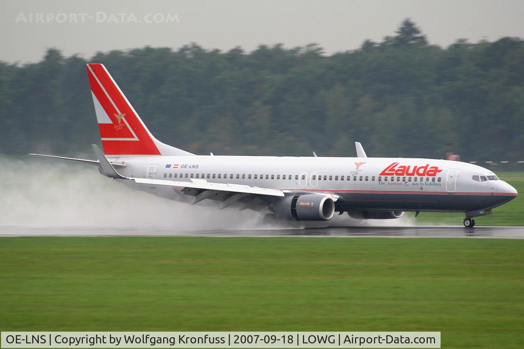 OE-LNS, 2005 Boeing 737-8Z9 C/N 34262, maximum reverse on wet runway!