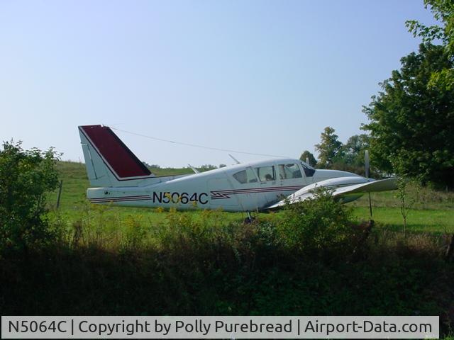 N5064C, 1974 Piper PA-E23-250 Aztec C/N 27-7405376, In a farmers field