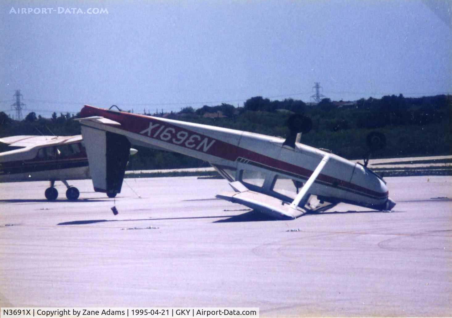 N3691X, 1969 Aero Commander 100 C/N 330, on the ramp at Arlington Muni - flipped by wind