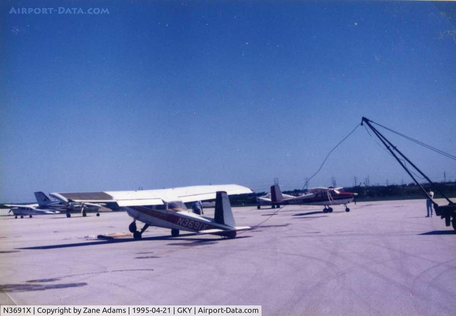 N3691X, 1969 Aero Commander 100 C/N 330, on the ramp at Arlington Muni - flipped by wind