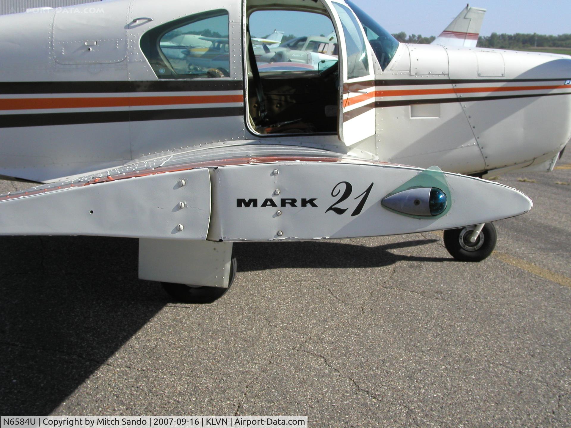 N6584U, 1962 Mooney M20C Ranger C/N 2366, Parked on the ramp at Airlake.