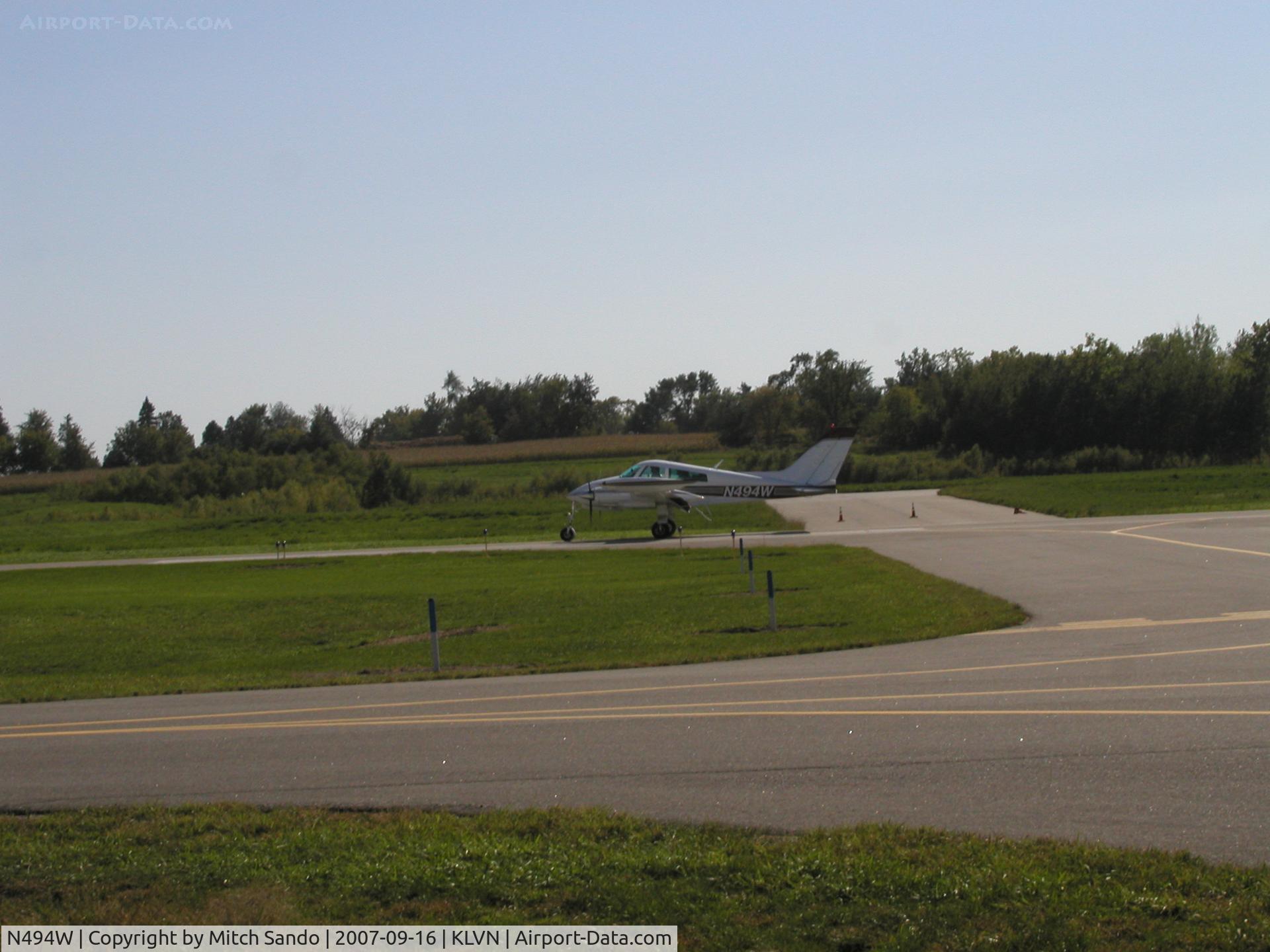 N494W, 1966 Cessna 310K C/N 310K0103, Landing Runway 12 VFR from Longville, MN (XVG).