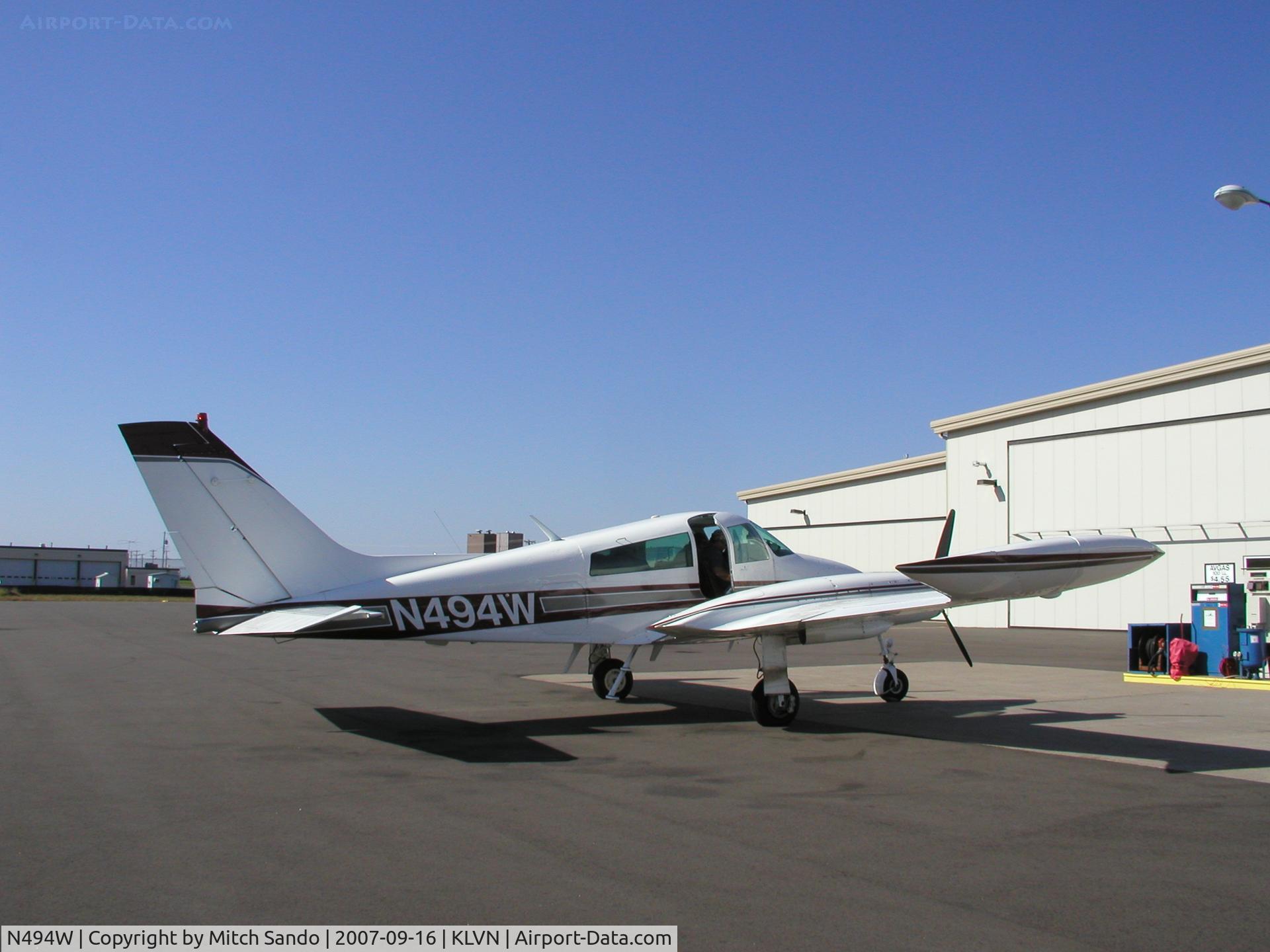 N494W, 1966 Cessna 310K C/N 310K0103, Parked at the fuel pumps at Airlake.