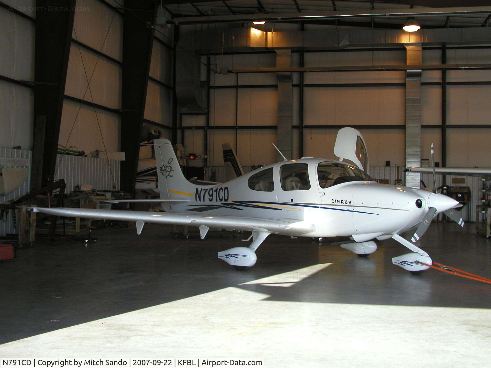 N791CD, Cirrus SR20 C/N 1424, Parked inside the maintenance hangar at Faribault.
