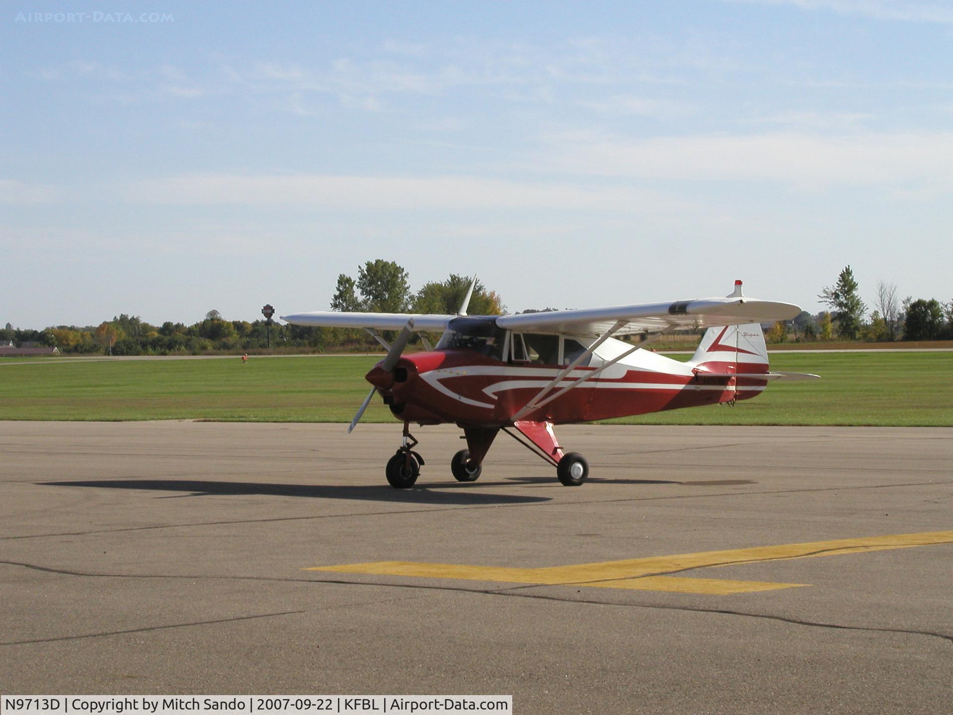 N9713D, 1959 Piper PA-22-160 Tri Pacer C/N 22-6625, Starting up on the ramp at Faribault.