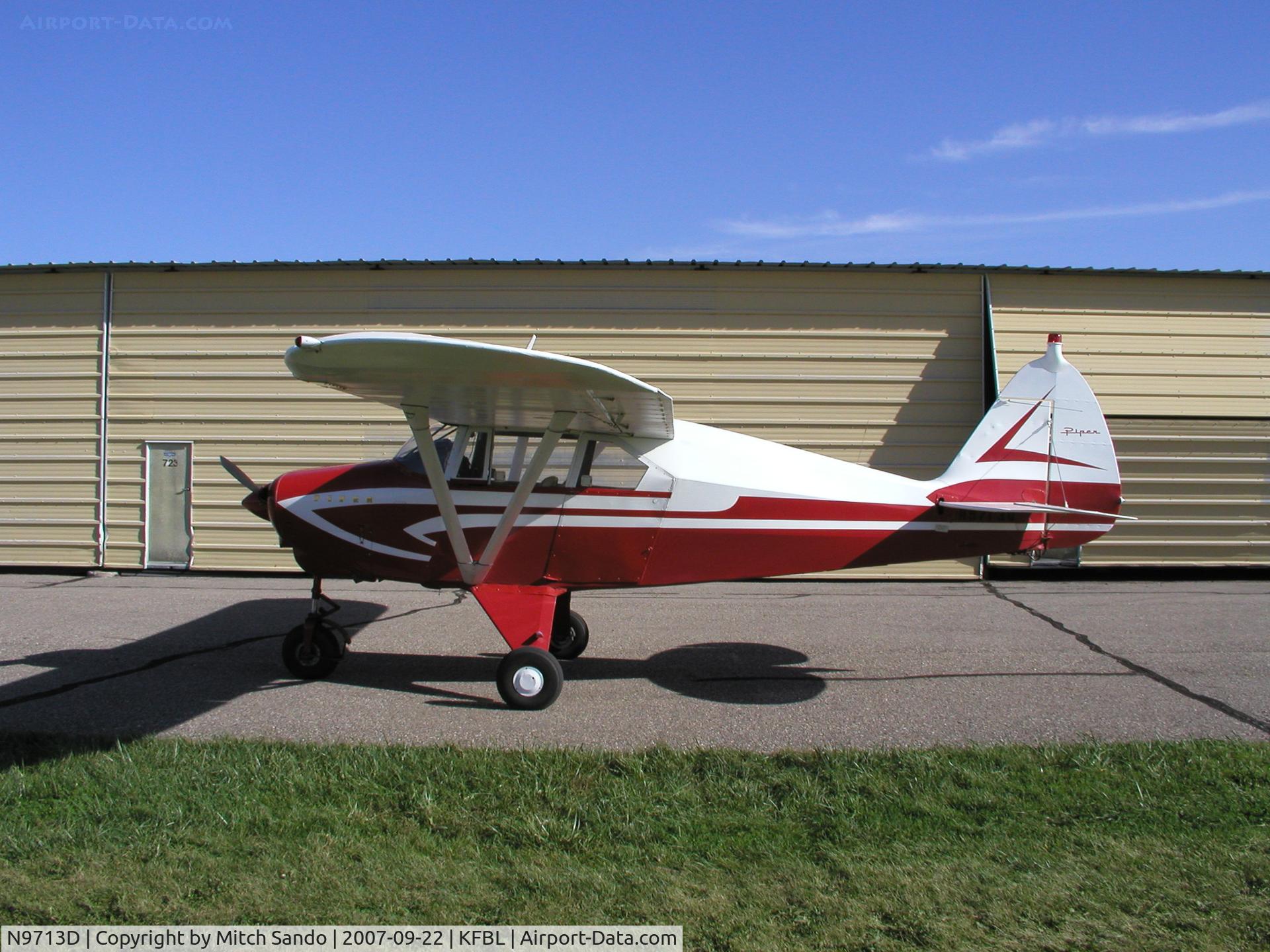 N9713D, 1959 Piper PA-22-160 Tri Pacer C/N 22-6625, Parked outside its hangar at Faribault.