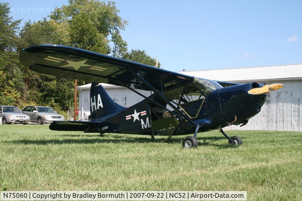 N75060, Stinson L-5E Sentinel C/N 76-3961, Taking a break after a morning of runing up the engine.