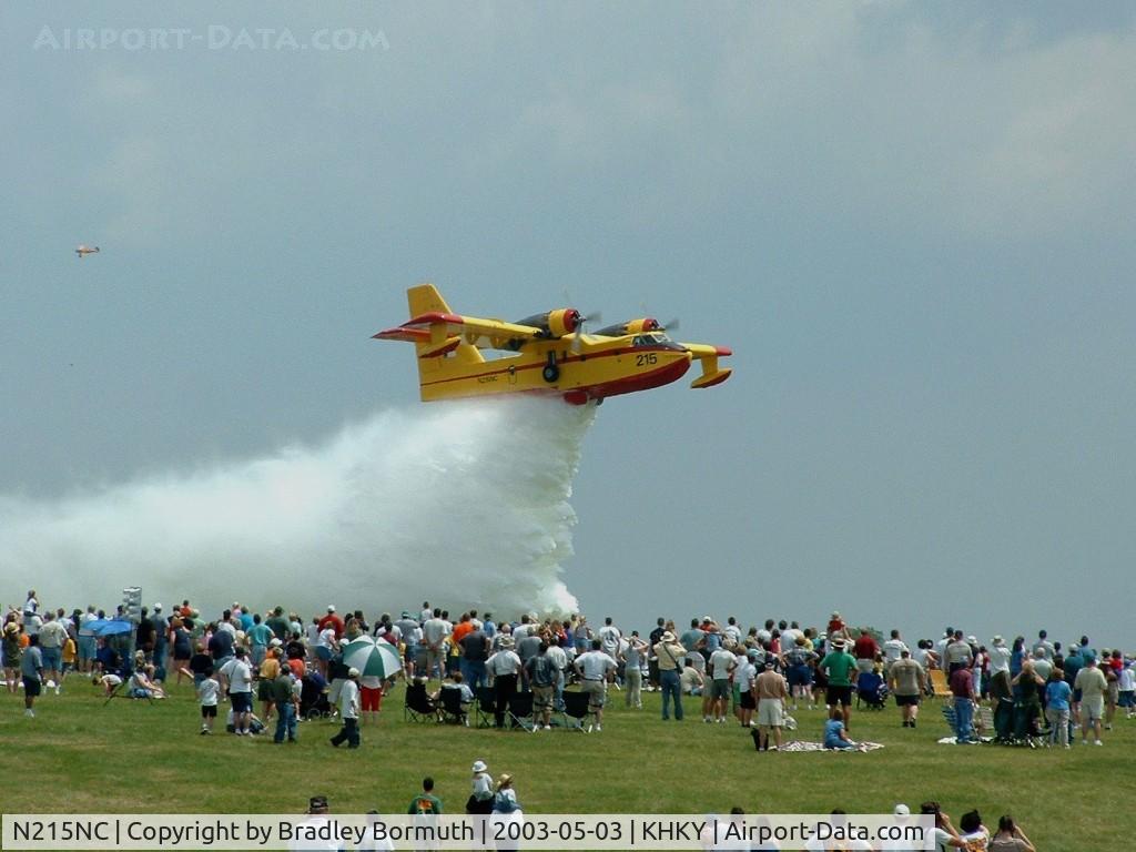 N215NC, 1969 Canadair CL-215-I (CL-215-1A10) C/N 1008, Droping a load of water for a crowd at the Warbirds Over Hickory Airshow in 2003.
