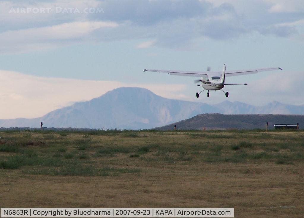 N6863R, 1967 Cessna T210G Turbo Centurion C/N T210-0263, Landing on 17L with Pikes Peak in the background.