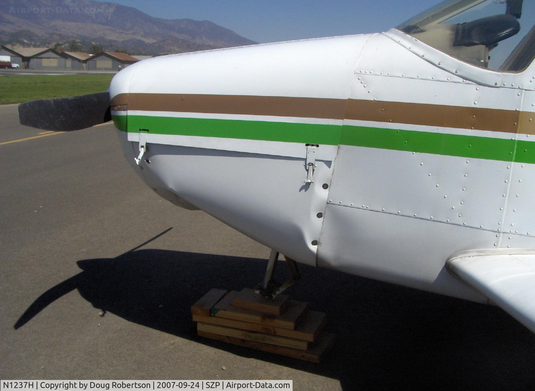 N1237H, Piper PA-28-140 Cruiser C/N 28-7725137, 1976 Piper PA-28-140 CRUISER, Lycoming O-320-E3D 150 Hp, landed long & hard on Rwy 22-bounced twice-overran end and crashed into dirt berm, aircraft totaled by Insurance Co., landing gear, prop, wings, fuselage damage, spinner dents