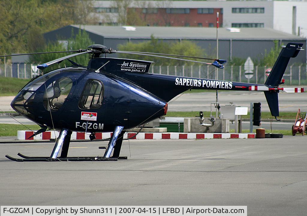F-GZGM, 1988 McDonnell Douglas MD-500E (369E) C/N 0309E, Parked on general aviation apron