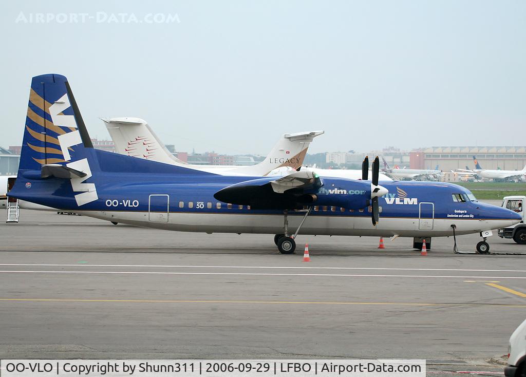 OO-VLO, 1988 Fokker 50 C/N 20127, Parked at the general aviation apron in new c/s