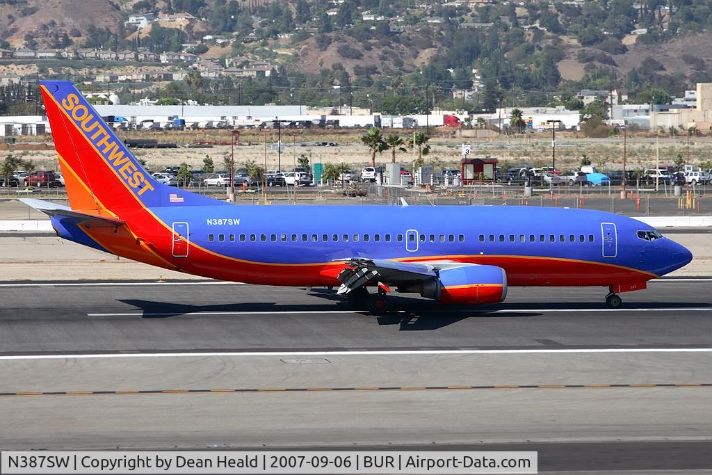 N387SW, 1994 Boeing 737-3H4 C/N 26602, Southwest Airlines N387SW (FLT SWA2992) from Sacramento Int'l (KSMF) concluding her landing rollout on RWY 8.