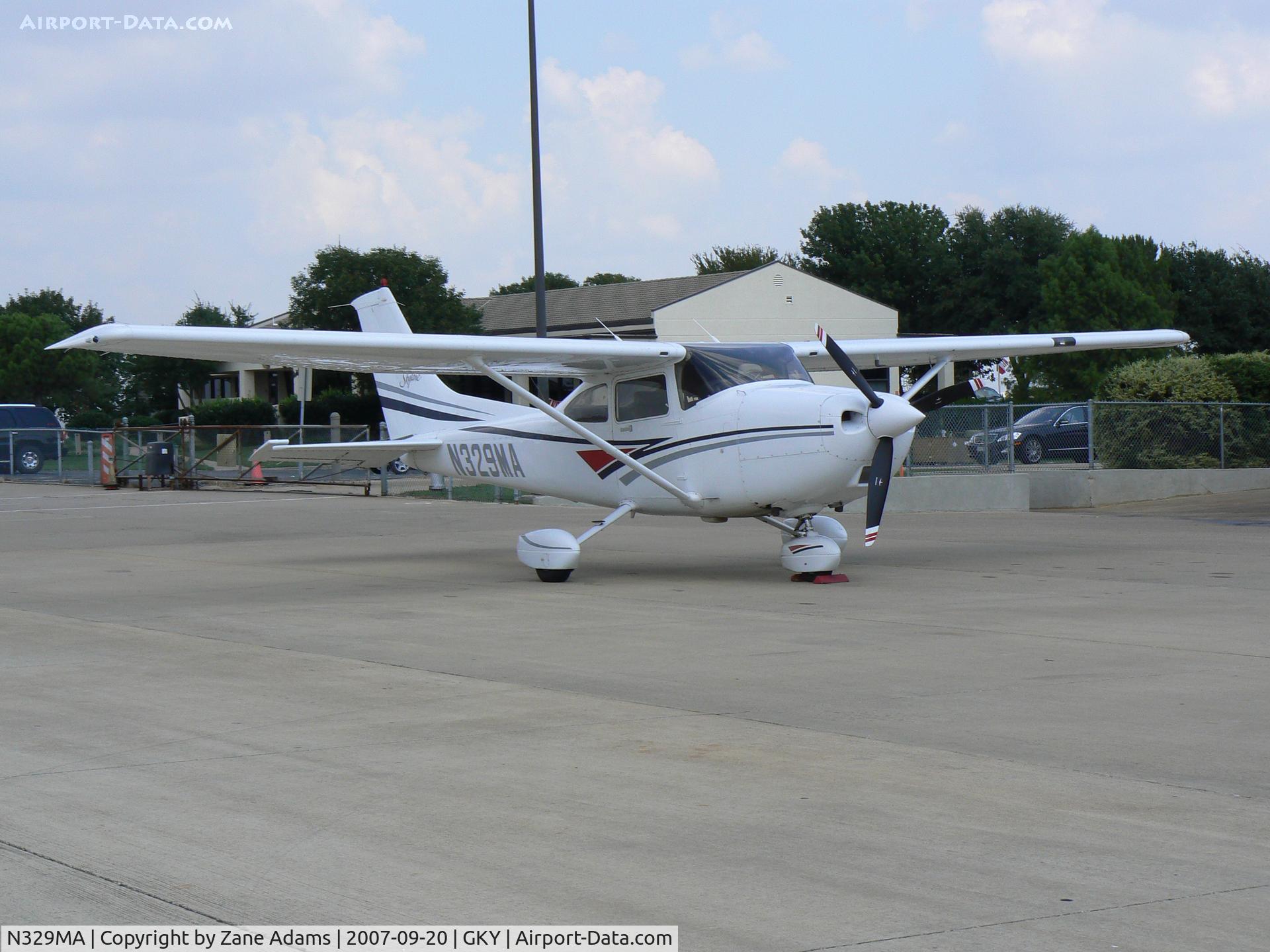 N329MA, 1998 Cessna 182S Skylane C/N 18280102, on the ramp at Arlington Muni