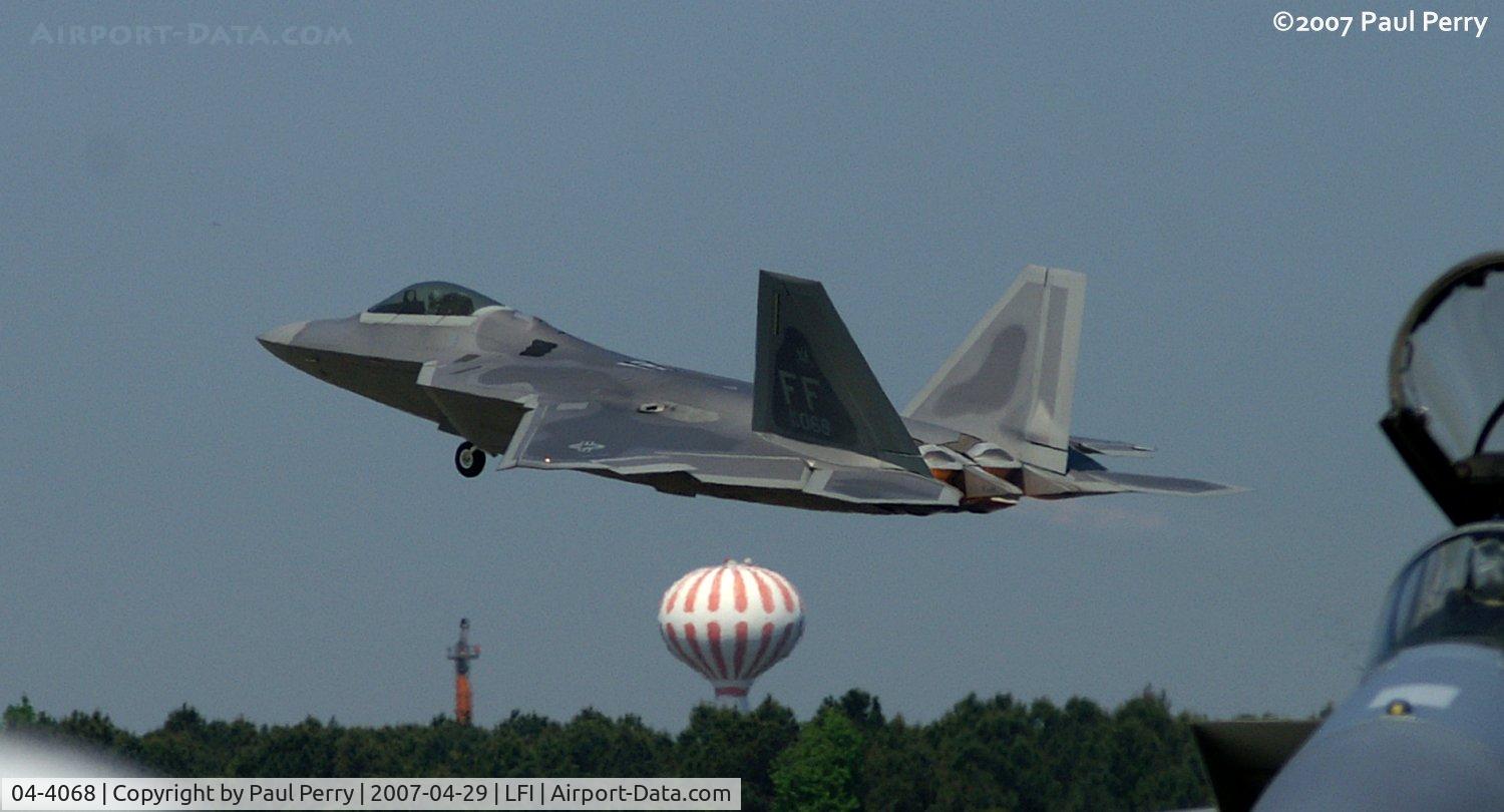 04-4068, 2004 Lockheed Martin F-22A Raptor C/N 4068, Getting the Raptor in the air, as I look past the Eagle