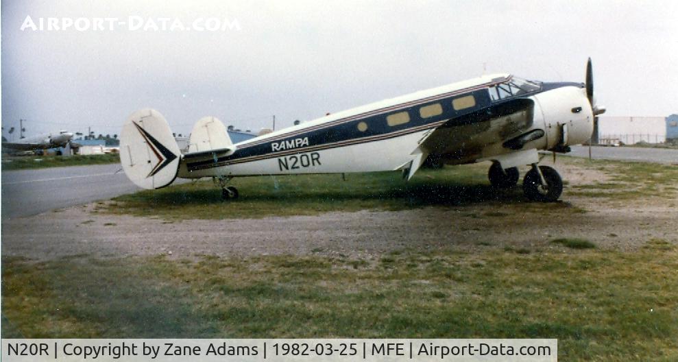 N20R, 1952 Beech Expeditor 3NM C/N CA-251, Beech !8 in the US Customs impound yard McAllen, TX