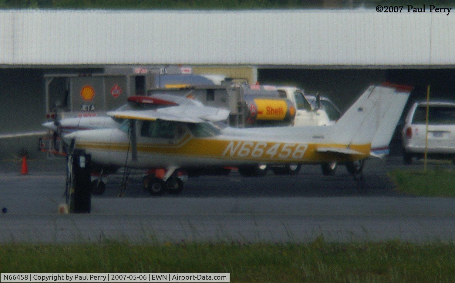 N66458, 1974 Cessna 150M C/N 15076062, Her colors almost blend in with the Shell trucks