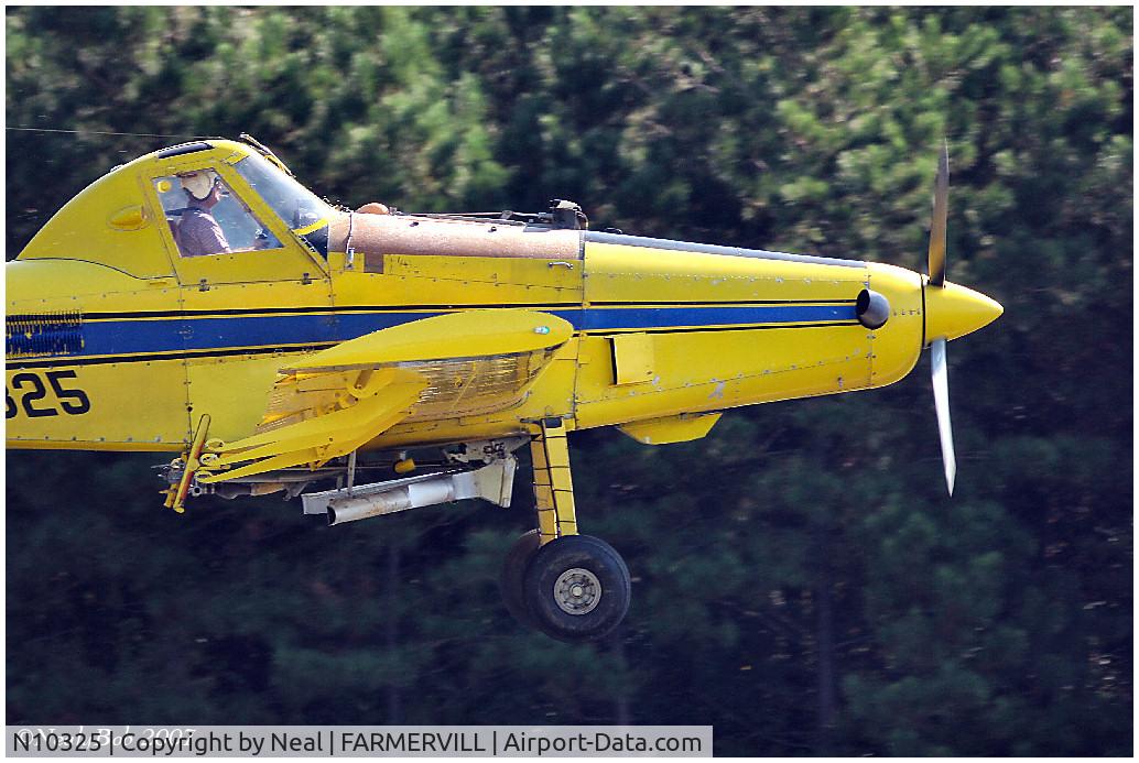 N10325, 1990 Air Tractor Inc AT-502 C/N 502-0078, Taking off to fertilize Pine trees