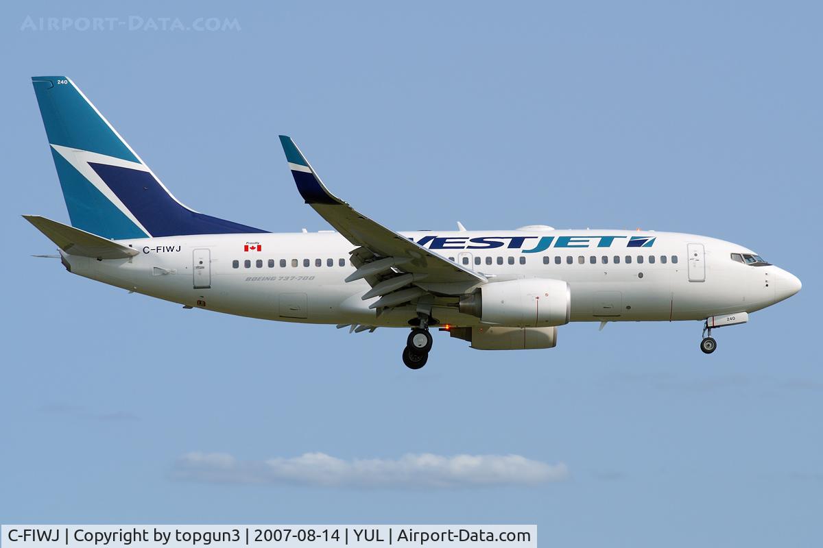 C-FIWJ, 2007 Boeing 737-7CT C/N 30712, short final for 24R.