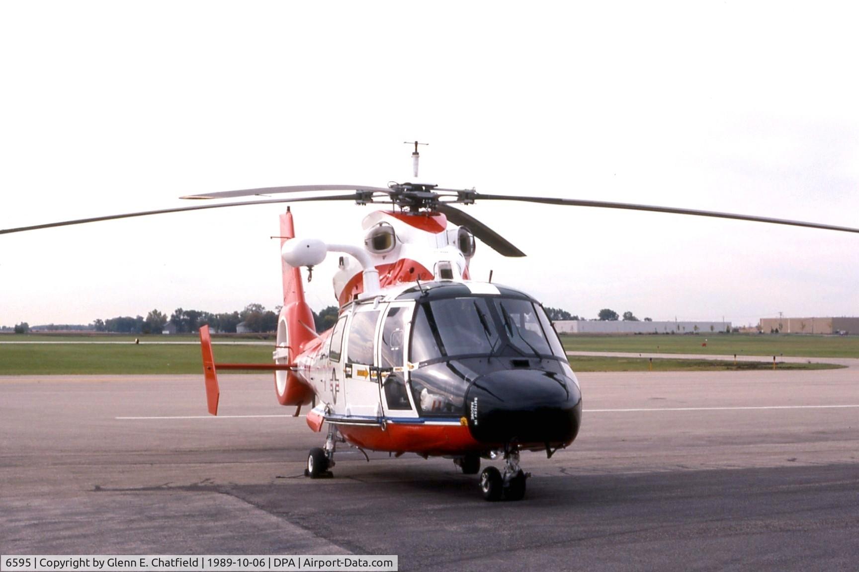 6595, 1989 Aerospatiale HH-65C Dolphin C/N 6297, HH-65A passing through.  Later upgraded to HH-65C