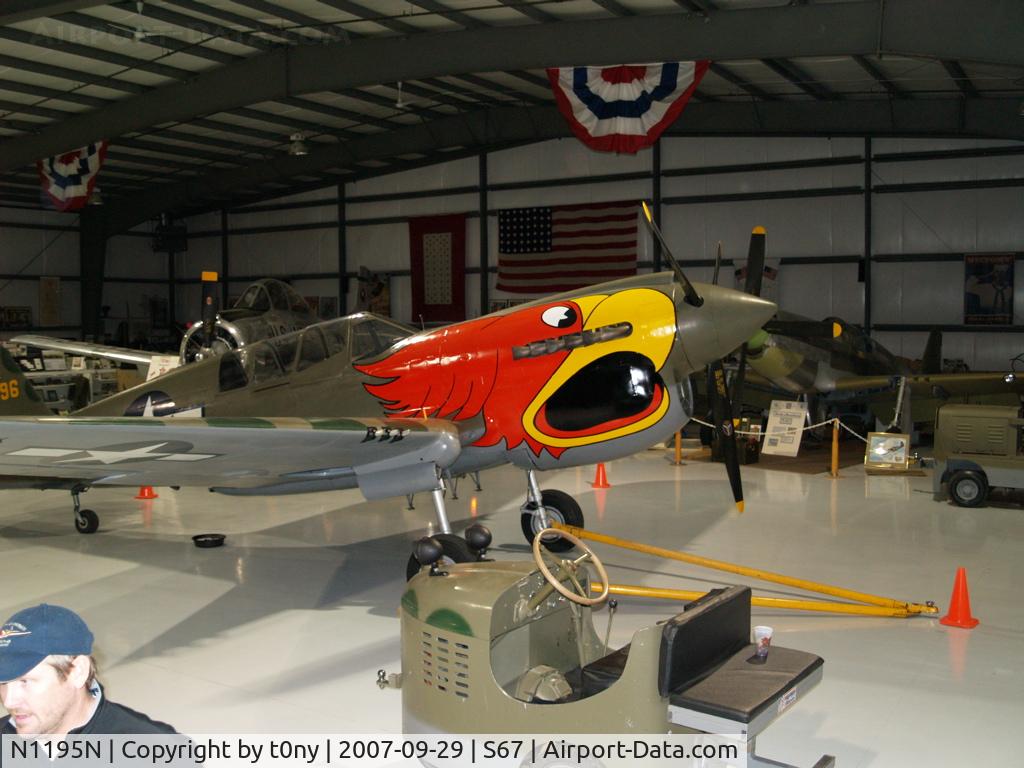 N1195N, 1942 Curtiss P-40N Warhawk C/N 130158, The new nose art on the P-40N at the Warhawk Air Museum.