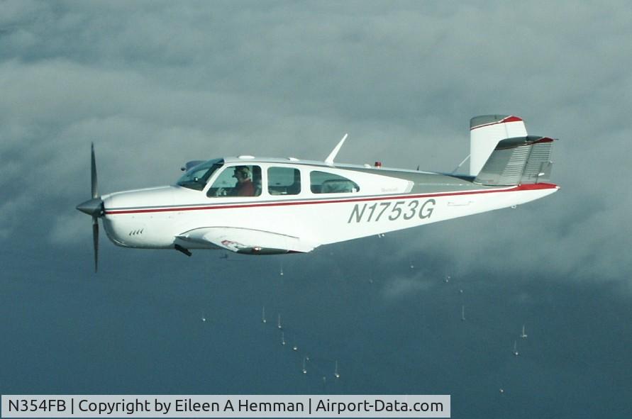 N354FB, 1962 Beech P35 Bonanza C/N D-6961, Over Puget Sound