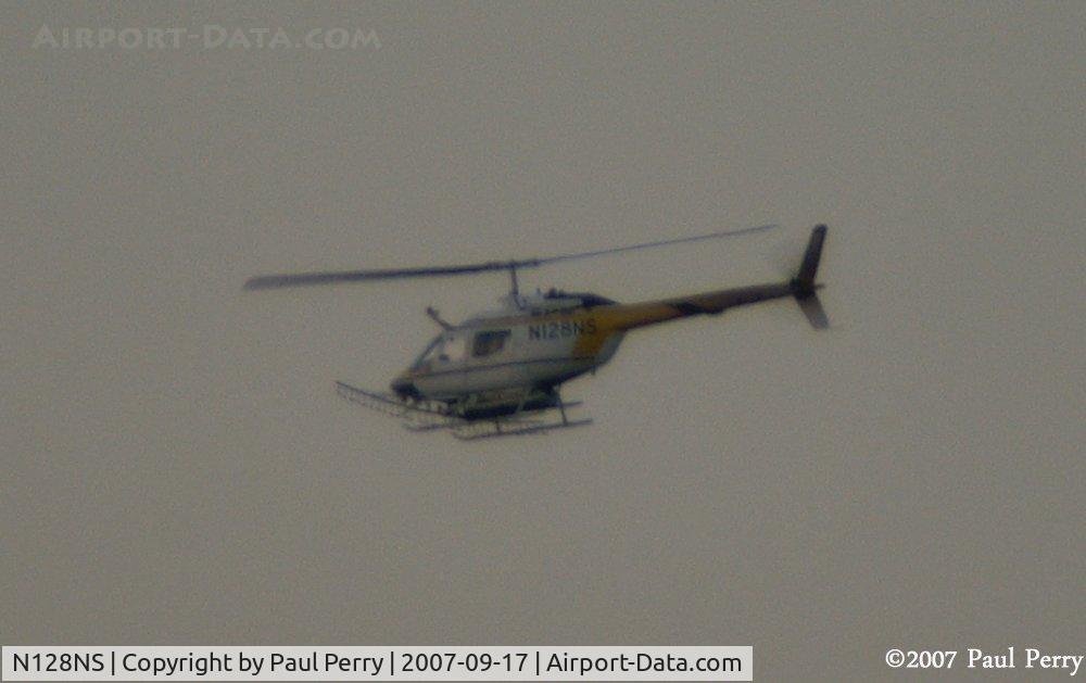 N128NS, 1970 Bell OH-58A Kiowa C/N 40679, Spray chopper working some fields near Ahoskie