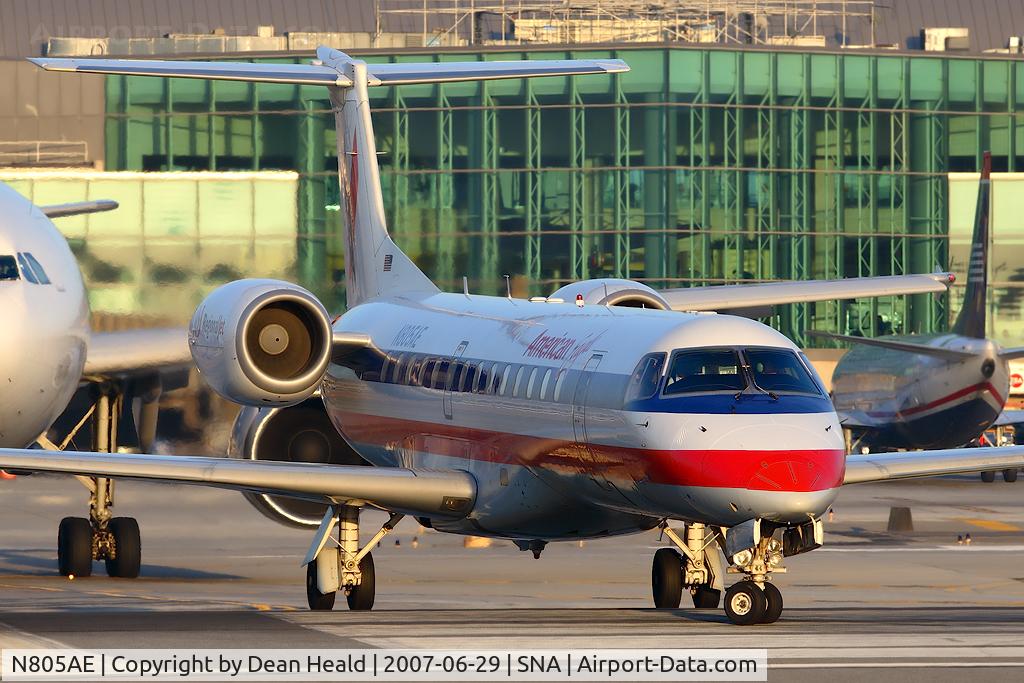 N805AE, 2001 Embraer ERJ-140LR (EMB-135KL) C/N 145489, American Eagle ERJ-140RJ N805AE (FLT EGF150) turning onto RWY 19R for departure to Norman Y Mineta San Jose Int'l (KSJC) with a FedEx A300 immediately behind it.