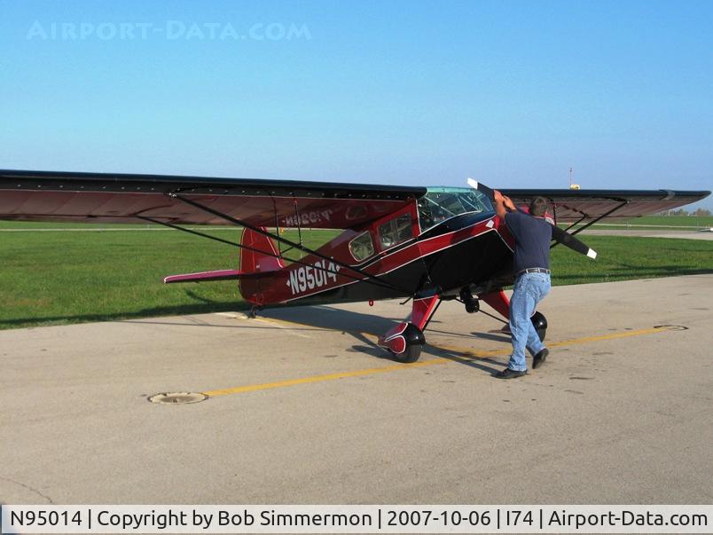 N95014, 1946 Taylorcraft BC12-D C/N 9414, Ed McCormick giving Sam a prop at Urbana, OH