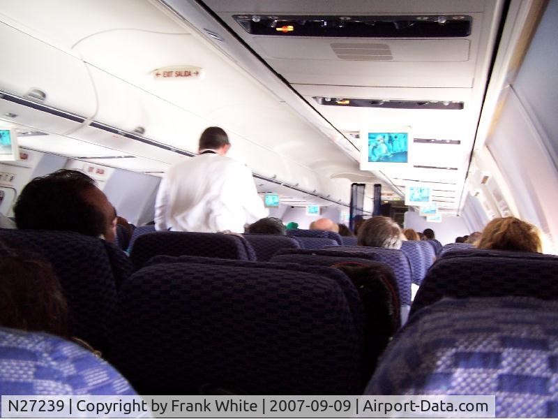 N27239, 1999 Boeing 737-824 C/N 28951, On board, meals being passed out, 37,000 over southern Arizona