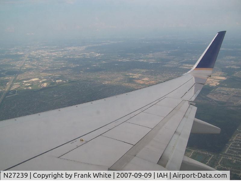 N27239, 1999 Boeing 737-824 C/N 28951, Wing of #239 as we were descending into the Houston area