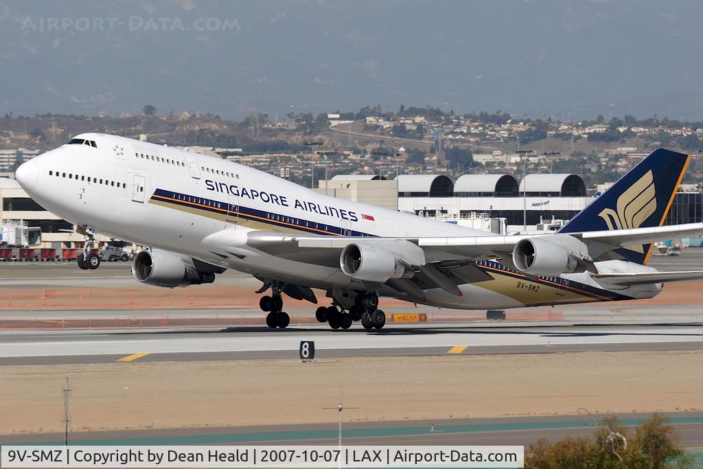 9V-SMZ, 1994 Boeing 747-412 C/N 26549, Singapore Airlines 9V-SMZ (FLT SIA11) departing RWY 25L enroute to Narita Int'l (RJAA).