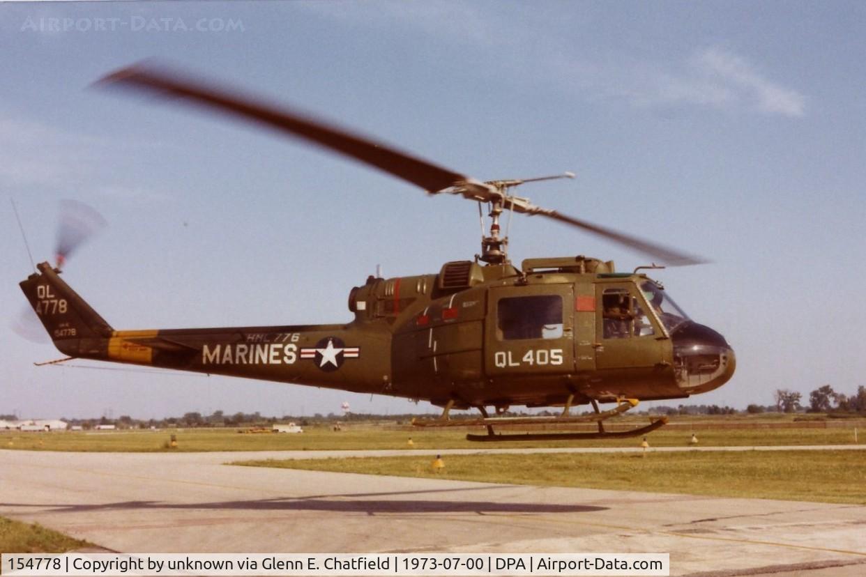 154778, 1965 Bell UH-1E Iroquois C/N 6162, UH-1E in for an air show.  35mm slide found at the Control Tower in 1983