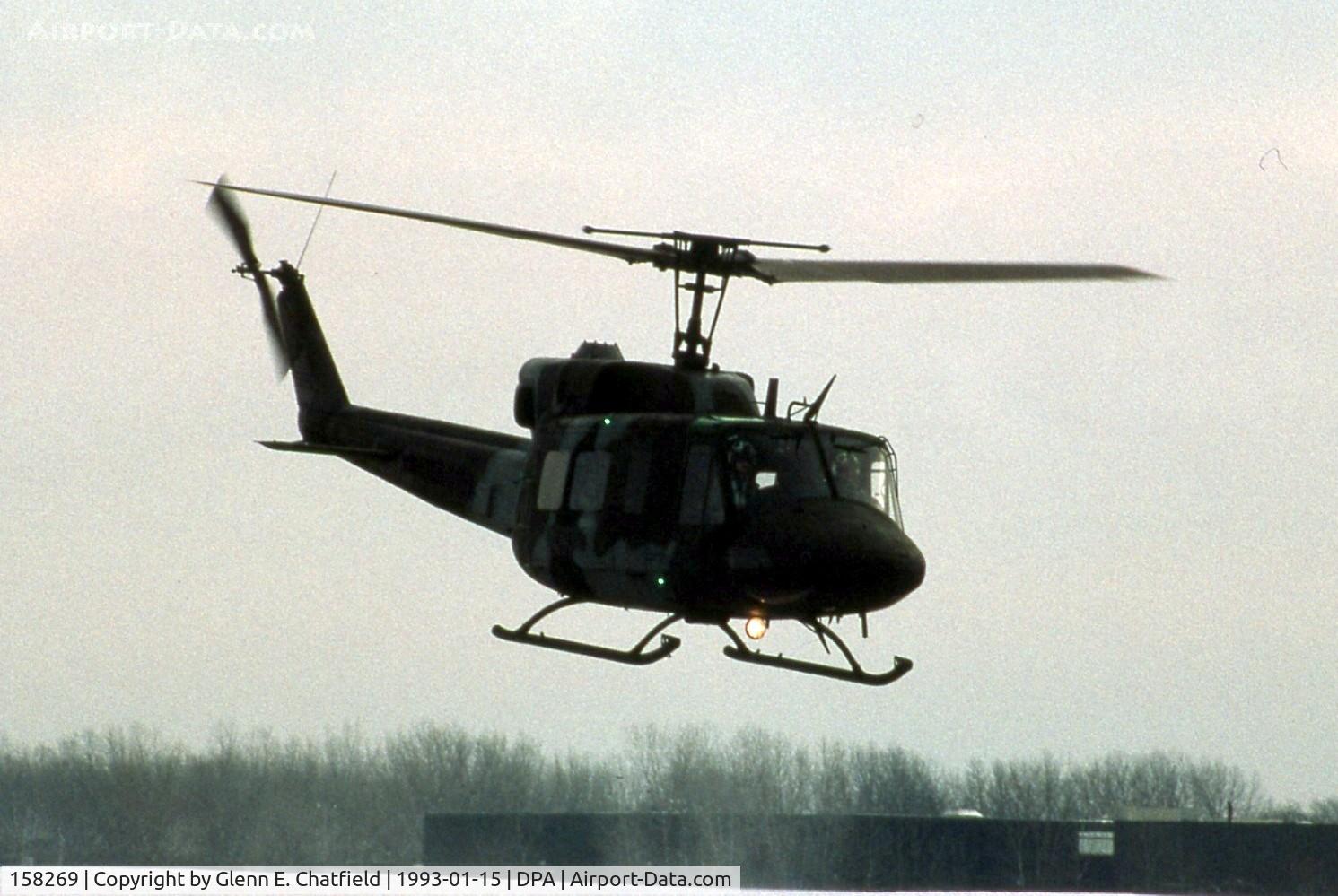 158269, Bell UH-1N Iroquois C/N 31440, UH-1N arriving just at sunset in the snow