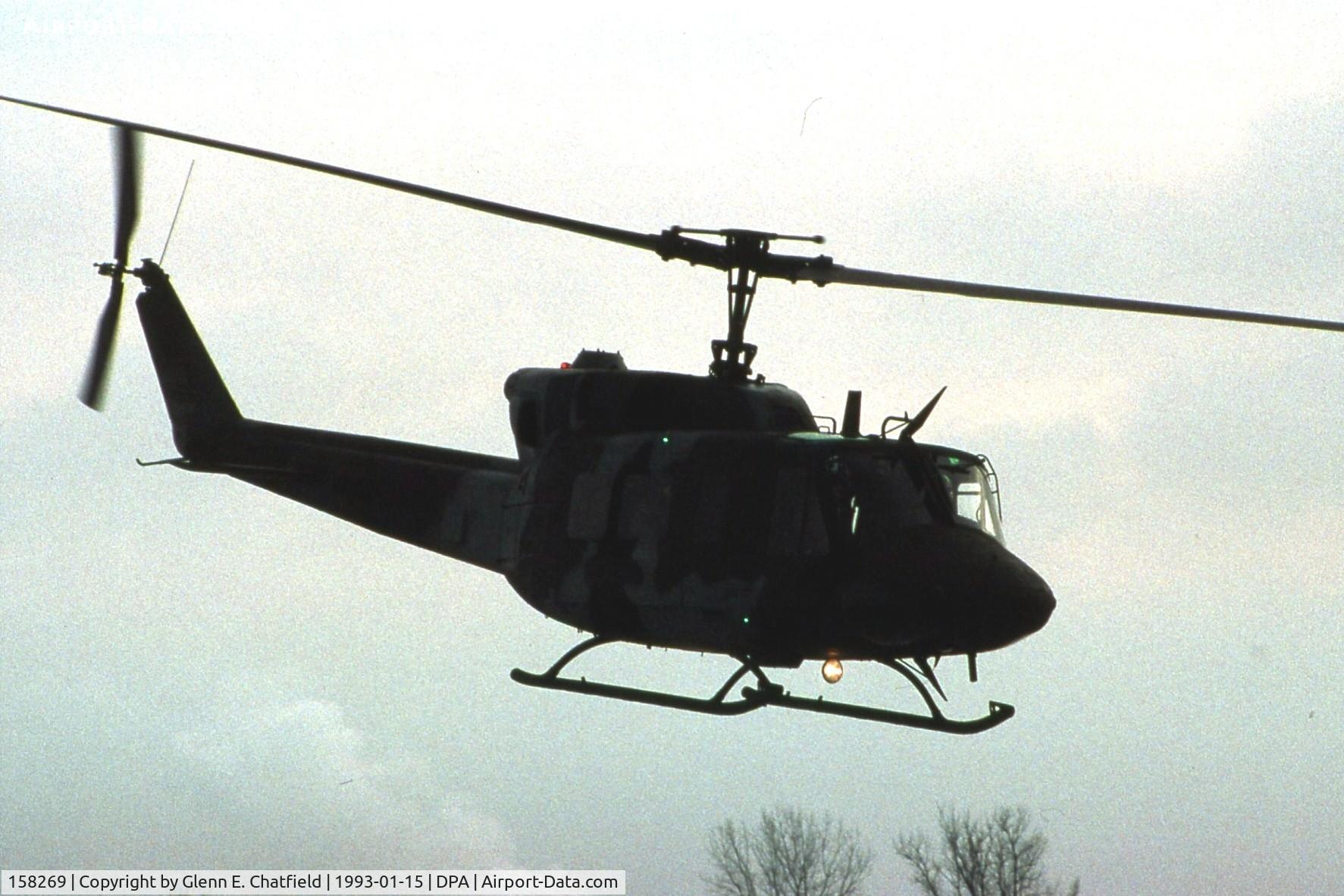 158269, Bell UH-1N Iroquois C/N 31440, UH-1N arriving just at sunset in the snow