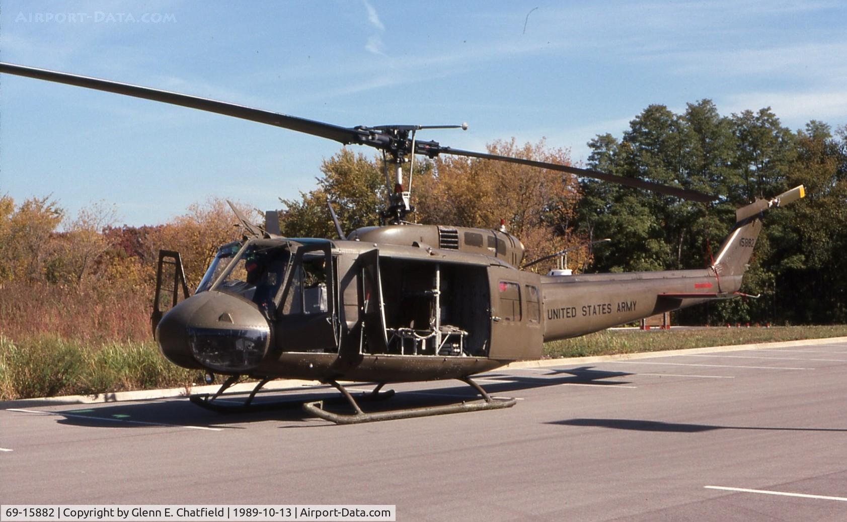 69-15882, 1969 Bell UH-1H Iroquois C/N 12170, UH-1H in motel parking lot for Helicopter Association International meeting.  Crystal Lake, IL