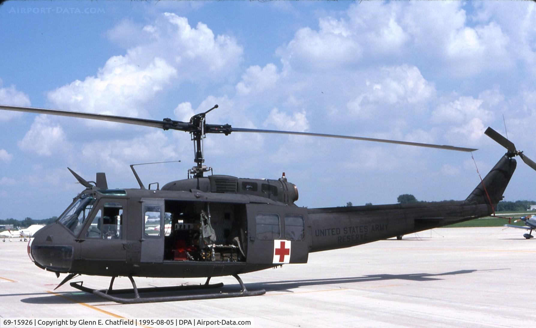 69-15926, 1969 Bell UH-1V Iroquois C/N 12214, Medevac Huey passing through.
